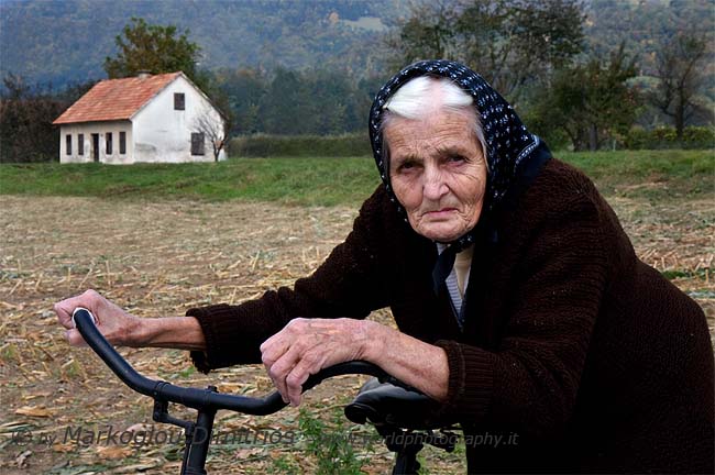 WOMAN WITH BICYCLE